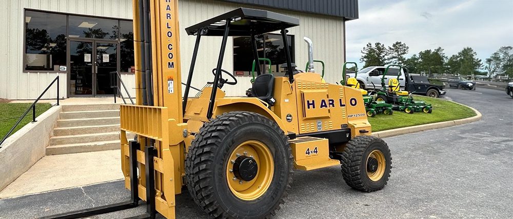 Harlo 4x4 rough terrain forklift parked outside the Harlo facility