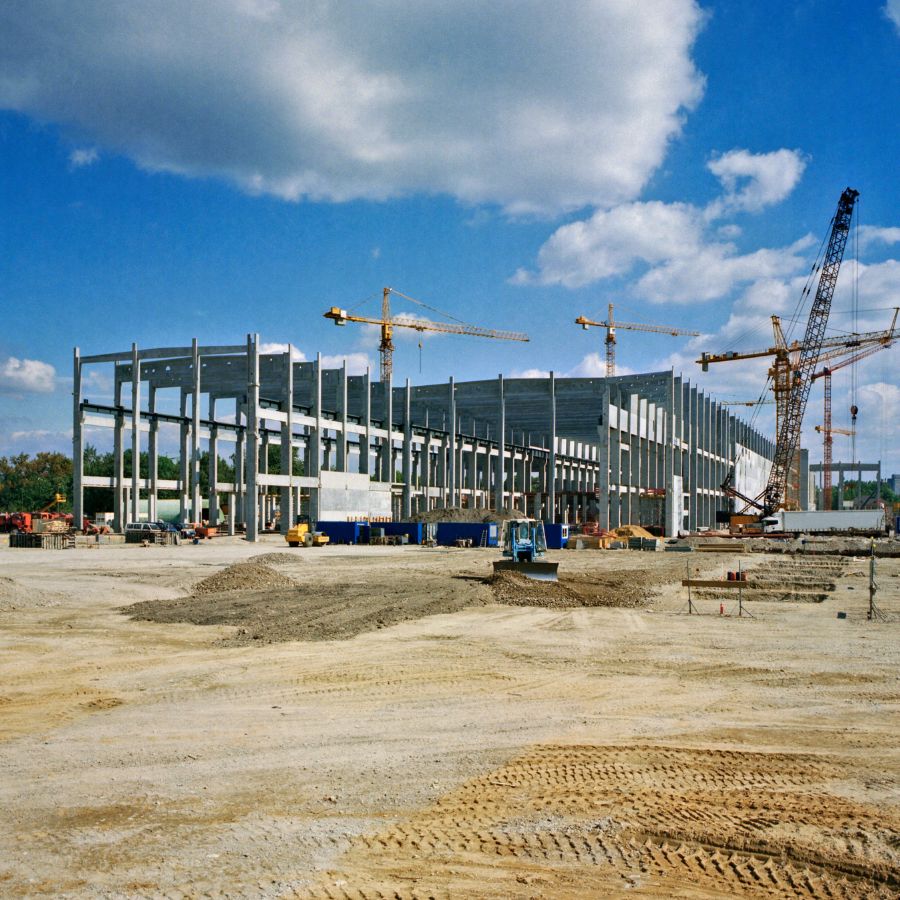 Construction Industry – Building Site Construction site with steel building frame and cranes, representing the construction industry Harlo forklifts serve